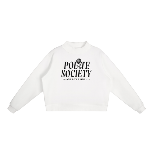 A white, long-sleeve crewneck sweatshirt with a black graphic on the chest stating: "Polite Society Certified 2026". The "I" in "Polite" is replaced with a rose and stem.