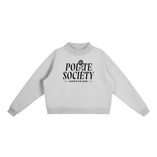 A grey, long-sleeve crewneck sweatshirt with a black graphic on the chest stating: "Polite Society Certified 2026". The "I" in "Polite" is replaced with a rose and stem.